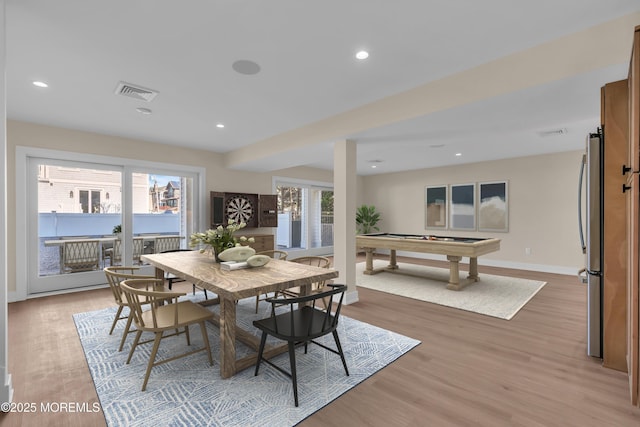 dining room with recessed lighting, visible vents, baseboards, and light wood finished floors