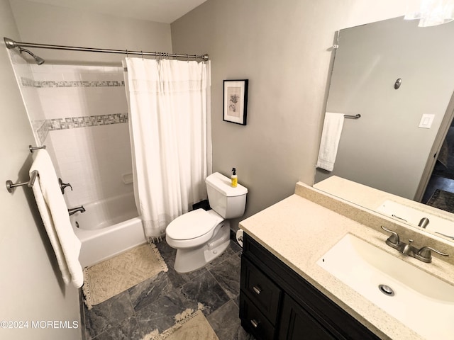 full bathroom with vanity, shower / bath combination with curtain, and toilet