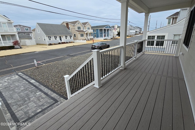 wooden terrace featuring a porch