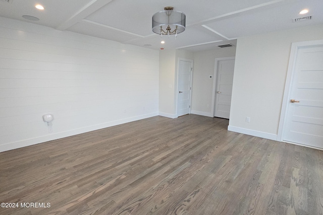 empty room featuring hardwood / wood-style flooring