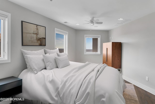 bedroom featuring baseboards, visible vents, recessed lighting, ceiling fan, and dark wood-type flooring