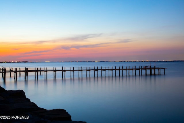 dock area featuring a water view