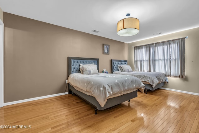 bedroom featuring light wood-type flooring