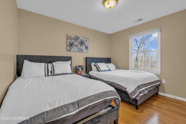 bedroom featuring hardwood / wood-style flooring