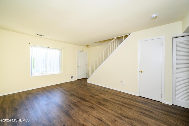 interior space with dark wood-type flooring