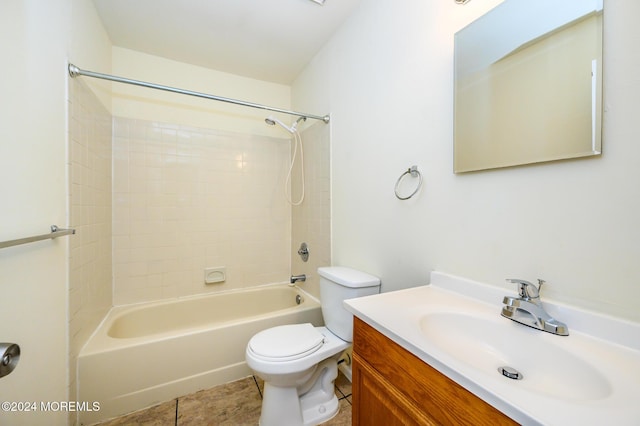 full bathroom featuring tile patterned flooring, shower / tub combination, vanity, and toilet