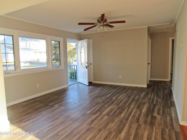 interior space featuring dark hardwood / wood-style floors, ceiling fan, and crown molding