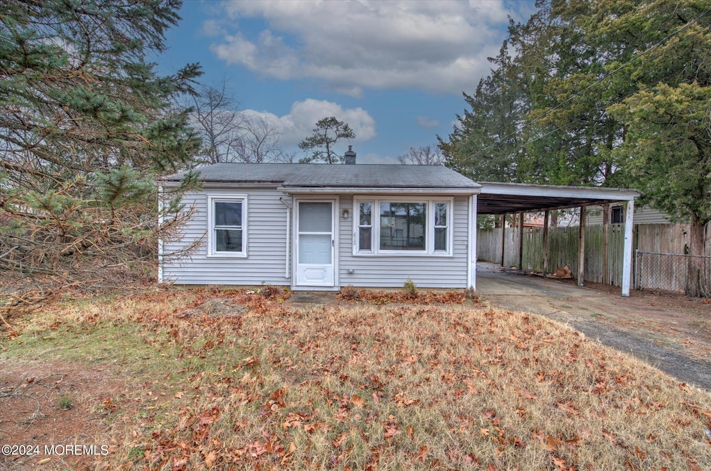 view of front of house with a carport