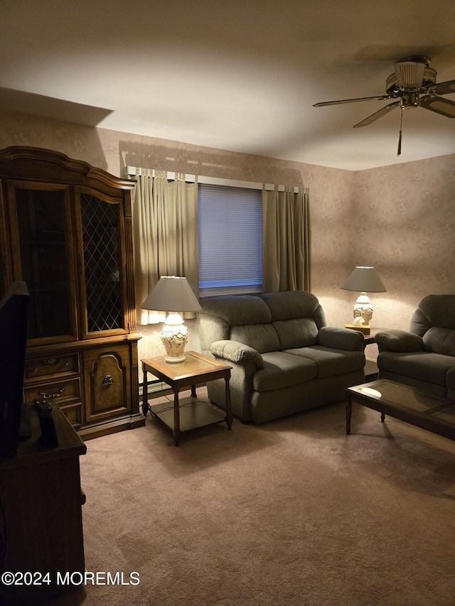 carpeted living room featuring ceiling fan