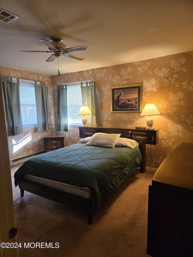 carpeted bedroom with ceiling fan