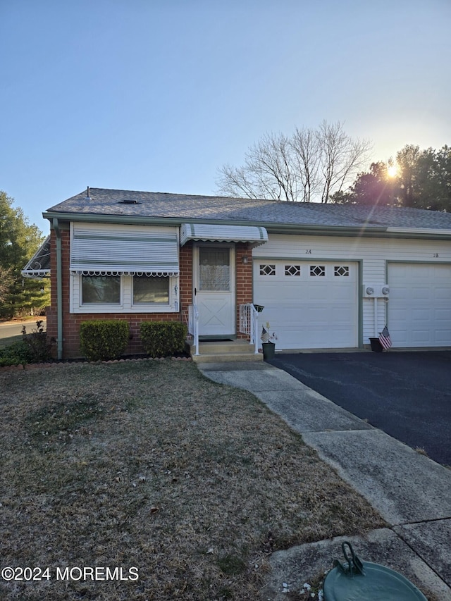 ranch-style home with a garage