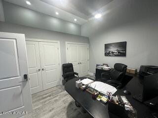 office space with light hardwood / wood-style flooring