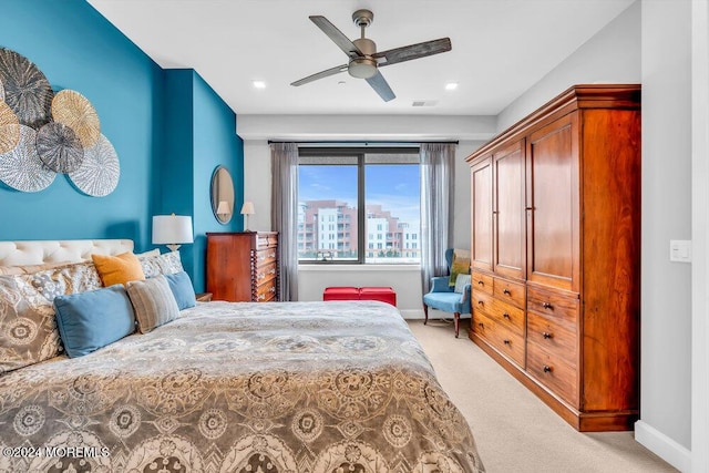 carpeted bedroom with ceiling fan