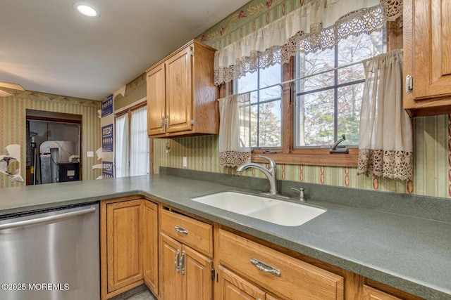 kitchen featuring dishwasher and sink