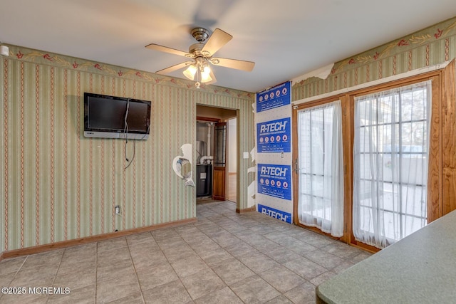 empty room featuring ceiling fan