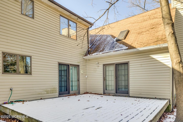 view of snow covered deck