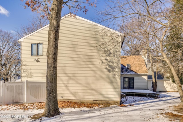 view of snow covered property