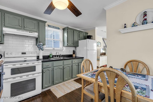 kitchen with range with electric cooktop, sink, white fridge, and ornamental molding