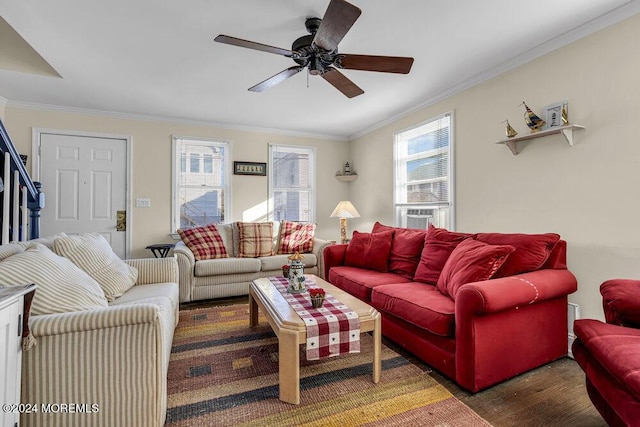 living room featuring a healthy amount of sunlight, cooling unit, ceiling fan, and ornamental molding