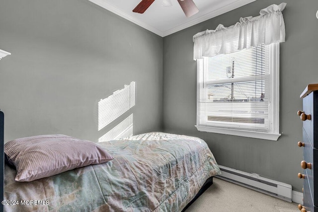 carpeted bedroom with ceiling fan, a baseboard radiator, and ornamental molding