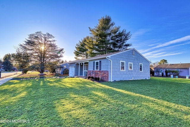 view of front of home with a front yard