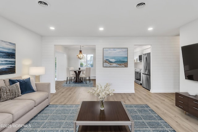 living room featuring light wood-type flooring