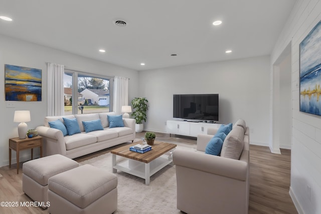 living room featuring light hardwood / wood-style floors