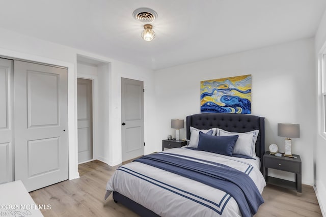 bedroom featuring light wood-type flooring