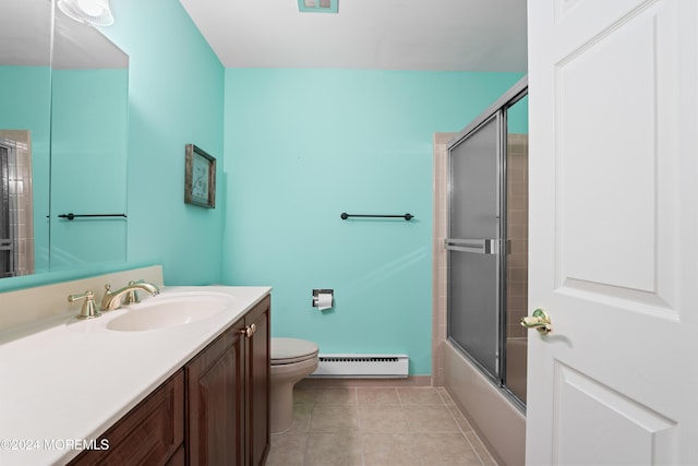 full bathroom with enclosed tub / shower combo, a baseboard heating unit, tile patterned floors, toilet, and vanity