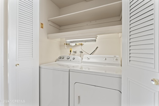 laundry area with washer and dryer