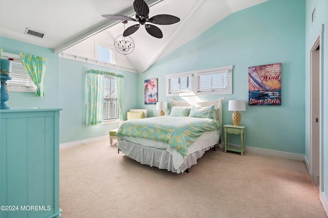 bedroom featuring ceiling fan, light carpet, and vaulted ceiling