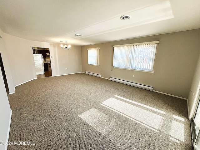 unfurnished room featuring carpet, a notable chandelier, and baseboard heating