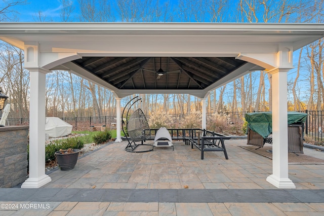 view of patio featuring a gazebo and ceiling fan