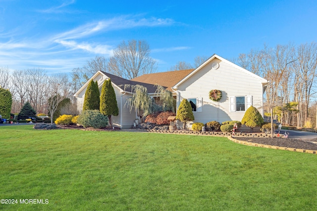 view of front of home with a front yard