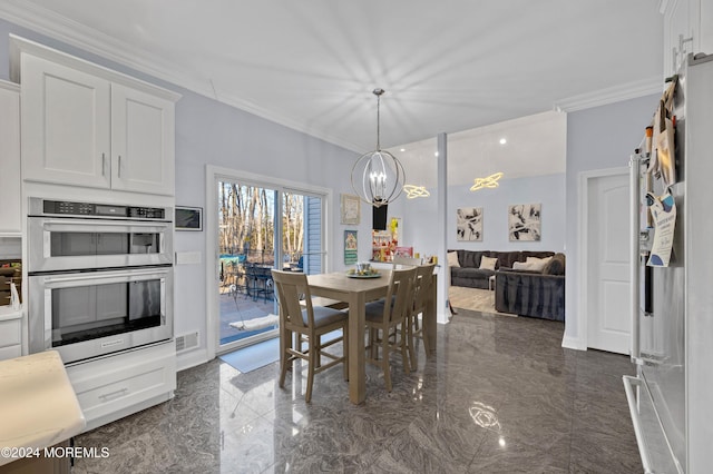 dining area featuring a notable chandelier and ornamental molding