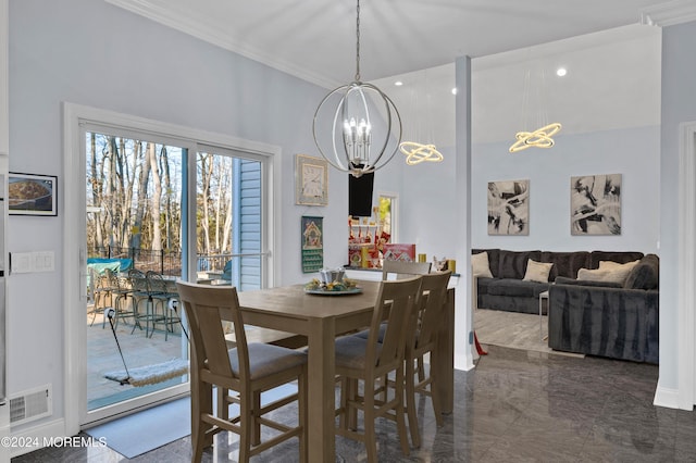 dining space featuring a chandelier and ornamental molding