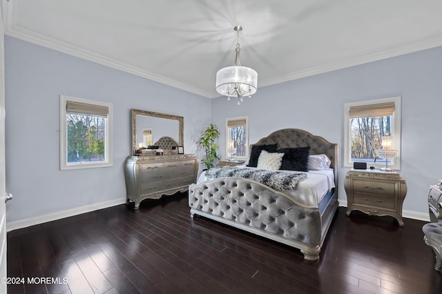 bedroom featuring ornamental molding, multiple windows, and dark wood-type flooring