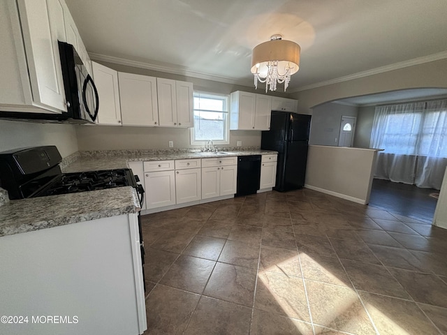 kitchen featuring sink, white cabinetry, crown molding, and black appliances