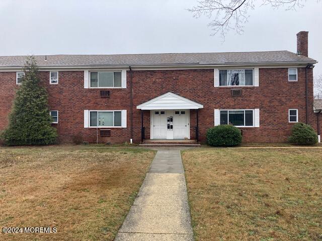 25 Laurel Pl Unit B, Eatontown, NJ 07724 - view of front facade with a front yard