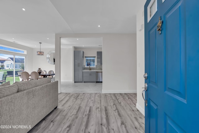 entrance foyer with light wood-type flooring