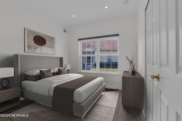 bedroom featuring dark wood-type flooring