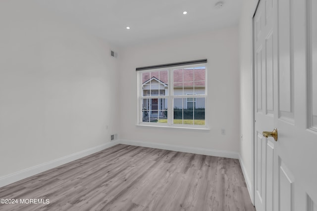 empty room featuring light hardwood / wood-style floors