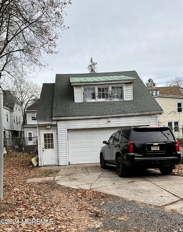 exterior space with a garage