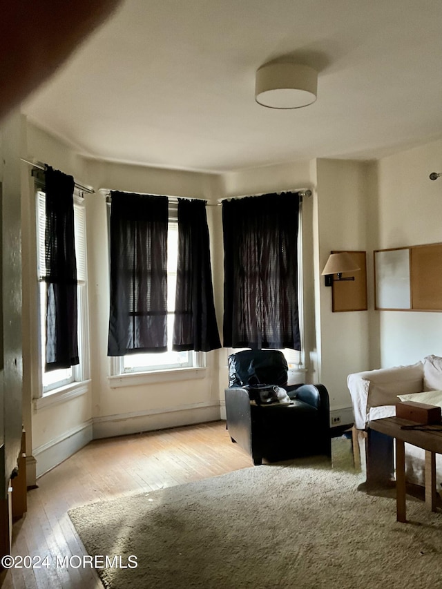 912 W State St, Trenton, NJ 08618 - living area featuring hardwood / wood-style floors and healthy amount of natural light