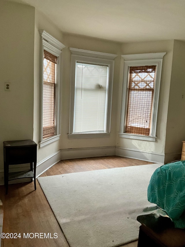 912 W State St, Trenton, NJ 08618 - living area featuring light wood finished floors and baseboards