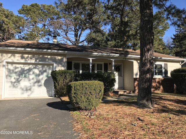 single story home with a garage