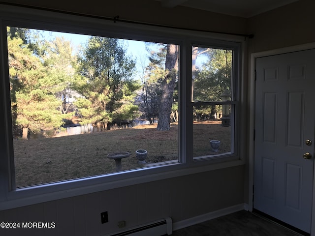 doorway featuring a baseboard radiator