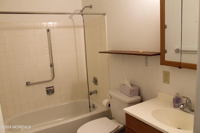 full bathroom featuring vanity, toilet, and tiled shower / bath