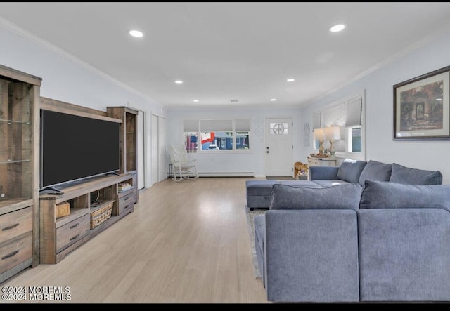 living room featuring light hardwood / wood-style floors, a baseboard radiator, and crown molding