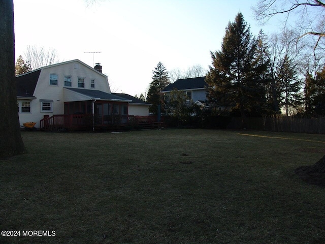 view of yard featuring a wooden deck